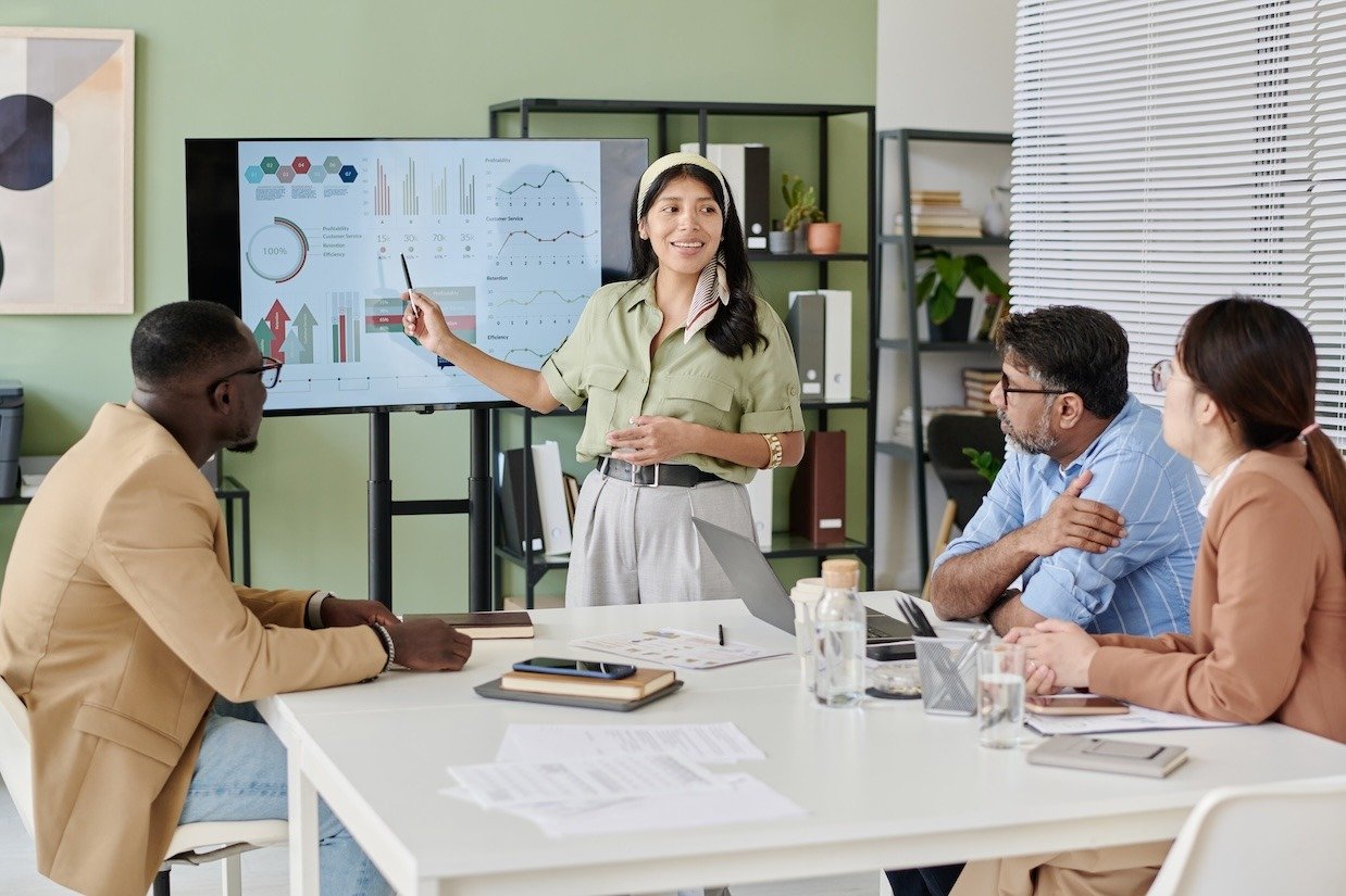 conducting-business-presentation-in-modern-office
